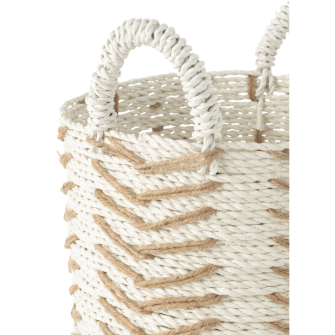 Close up of Handwoven raffia and cotton baskets used for home decor and storage.