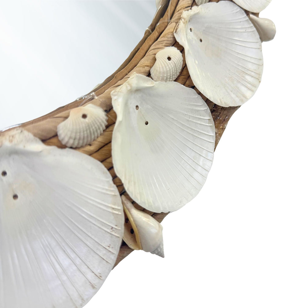 Close-up of handcrafted weave and shell texture on Kerang mirror