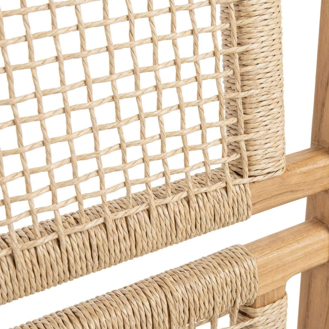 Close-up detail of the woven synthetic rattan texture within the teak wood frame.