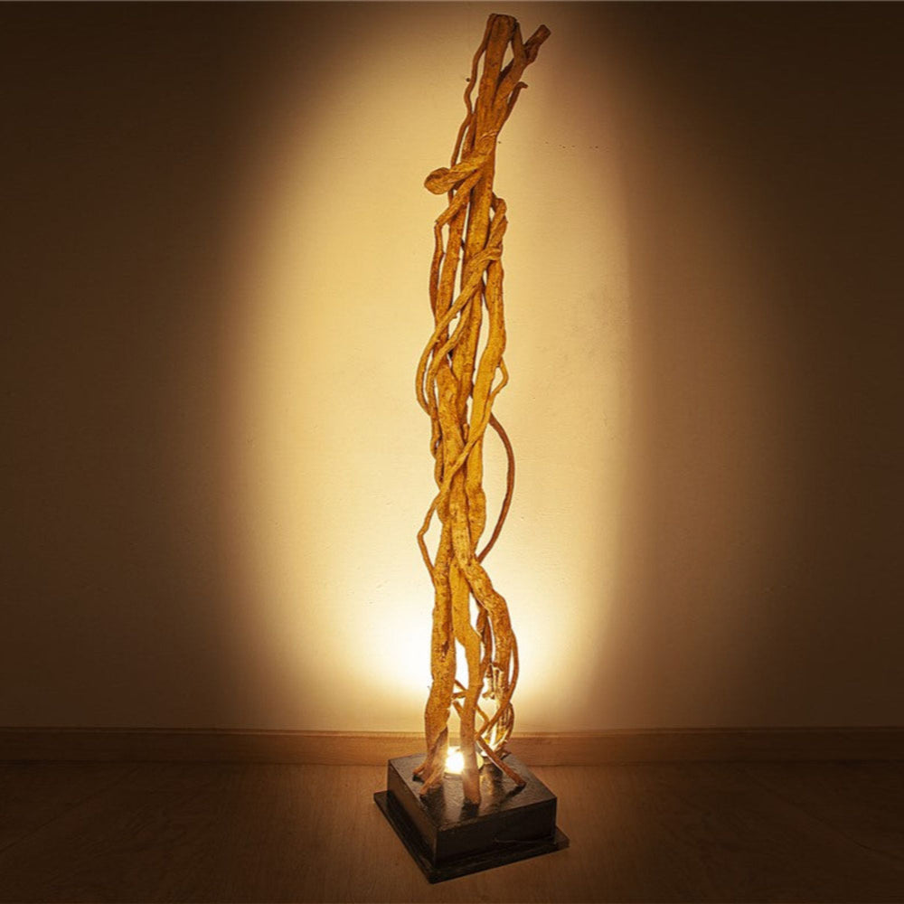 Organic sculptural wooden floor lamp with warm light, 180 cm.