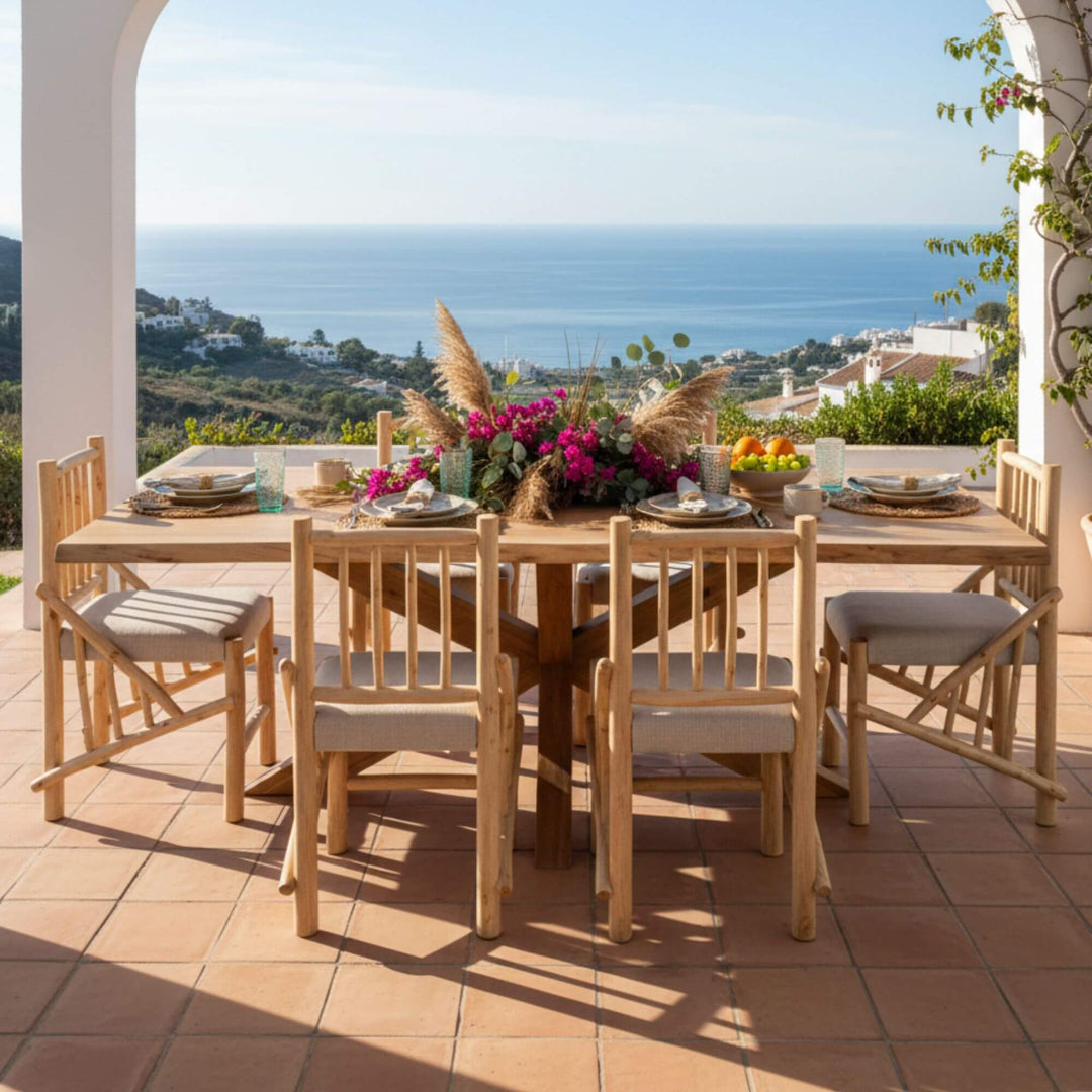 Outdoor setting of Kobe teak branch dining chair and Lea dining table