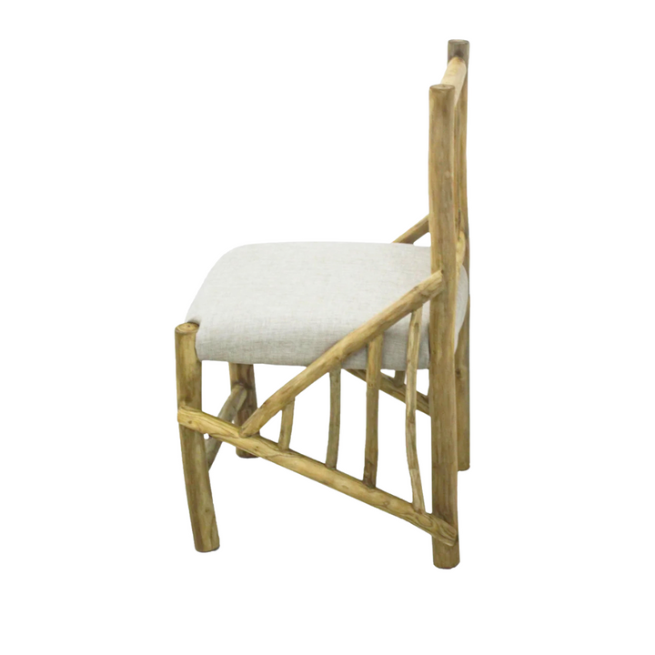 Side profile of Kobe teak dining chair showing branch frame and cushion