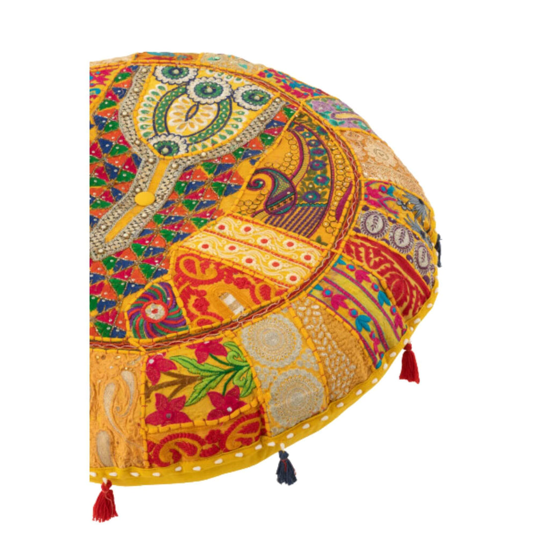 Close-up of KOOD Puff showing embroidered patterns and stitching.