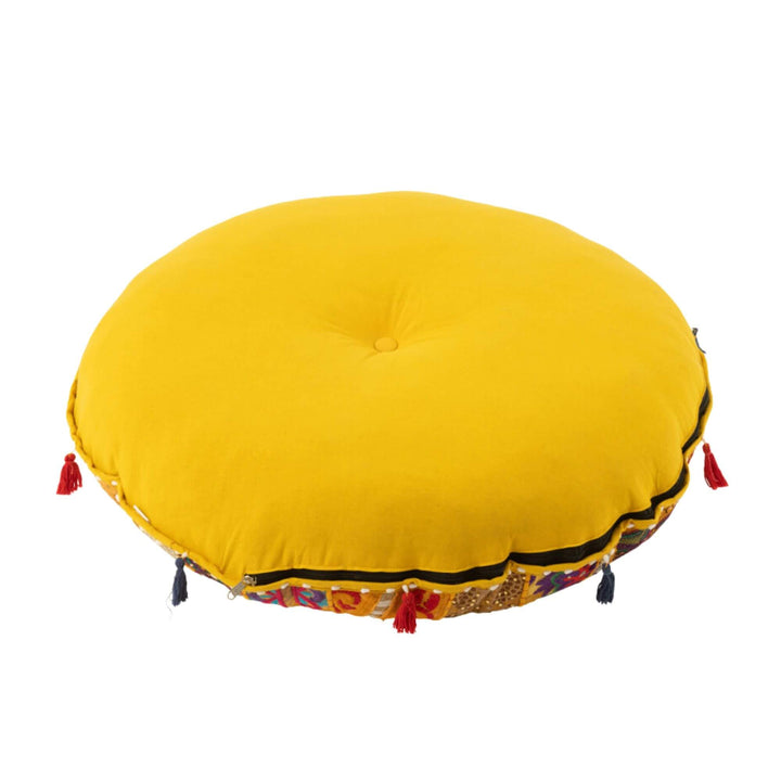 Yellow KOOD floor pouf variant with soft cushioned top.
