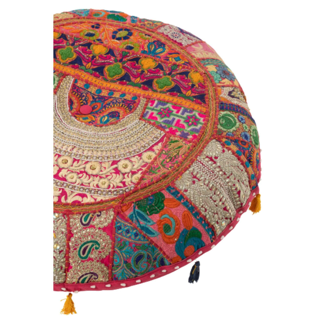 Close-up of KOOD Puff showing embroidered patterns and stitching.