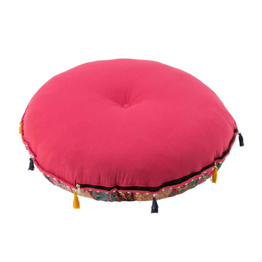 Pink KOOD floor pouf variant with tassel accents.