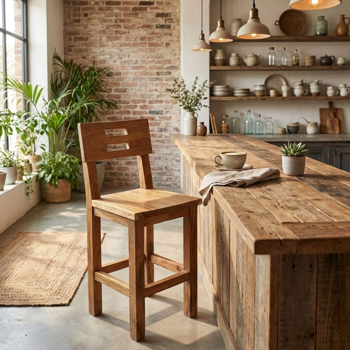 Styled interior view of Krios Teak Bar Stool placed at a wooden kitchen island.