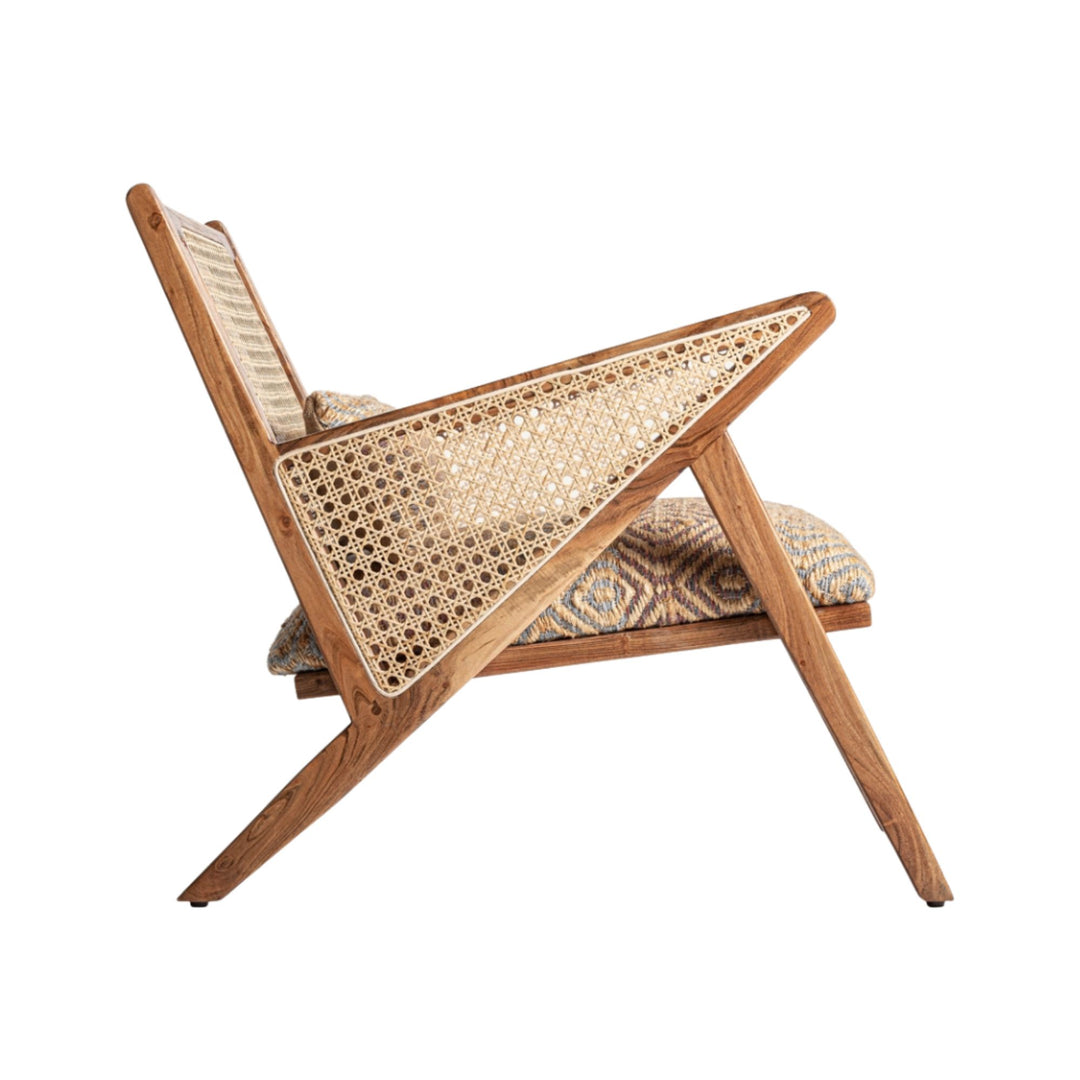 Side view of handmade teak lounge chair with woven details