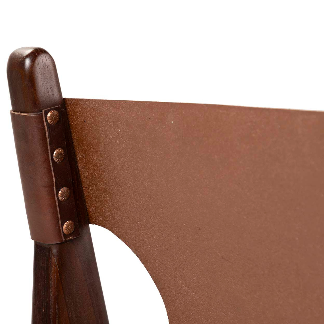 Detail of the backrest cut-out design and leather texture of Kwesi chair