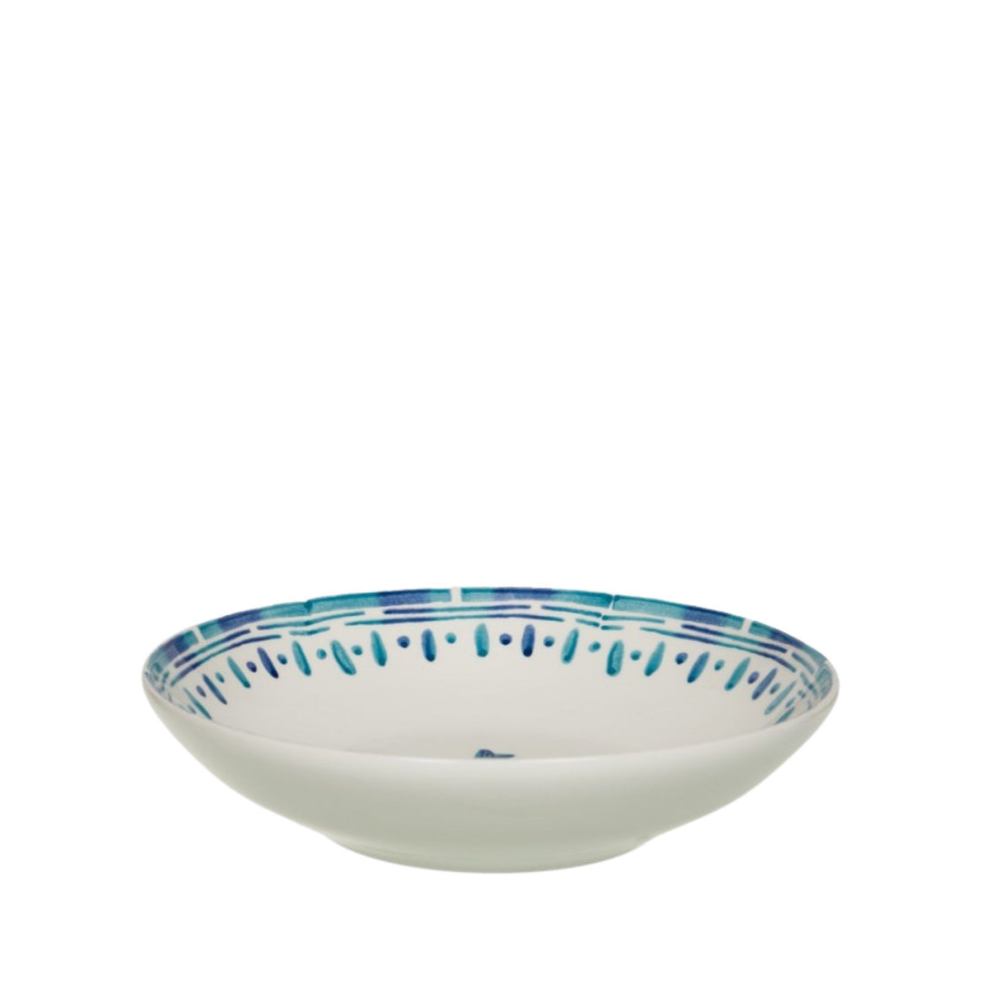 Side view of the Kyanos ceramic bowl with hand-painted blue detailing around the rim