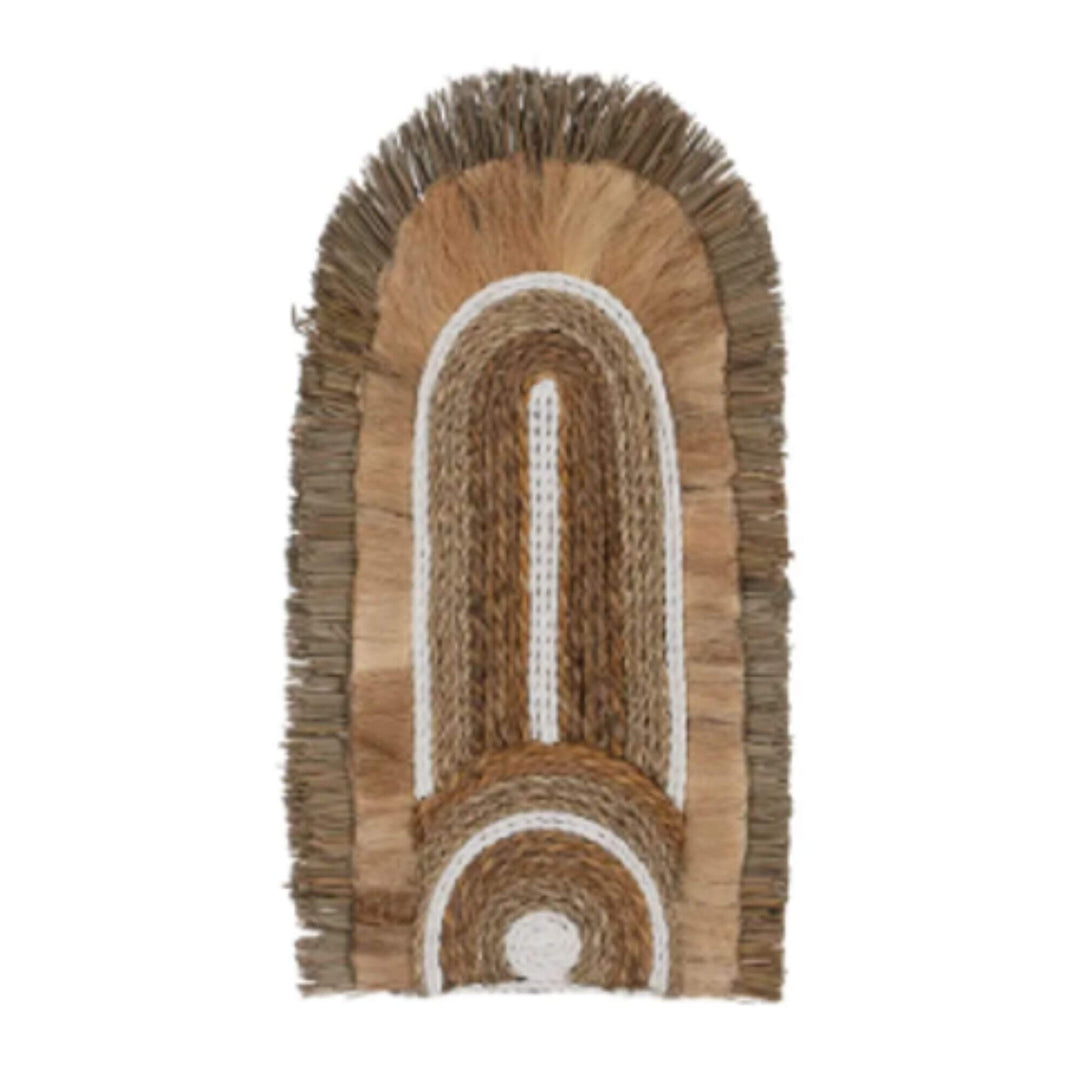 Handcrafted rattan and natural fiber wall decor from the Kalalao Collection in natural and white tones with arched layered design.