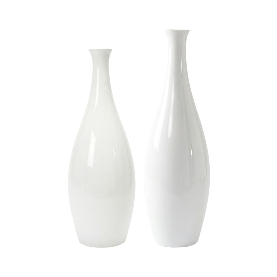 Grouped display of Lac vases in different sizes showcasing sculptural proportions.