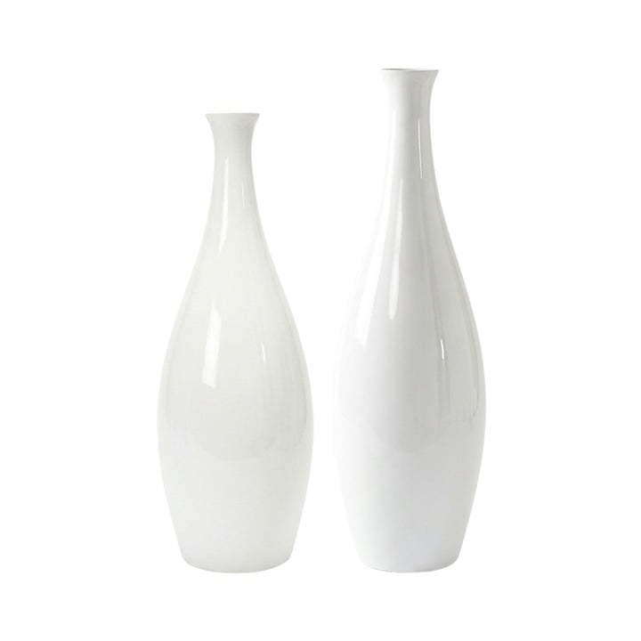 Grouped display of Lac vases in different sizes showcasing sculptural proportions.