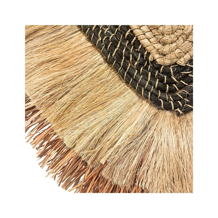 Close-up of Laras Wall Deco showing woven abaca fibers and natural textures.