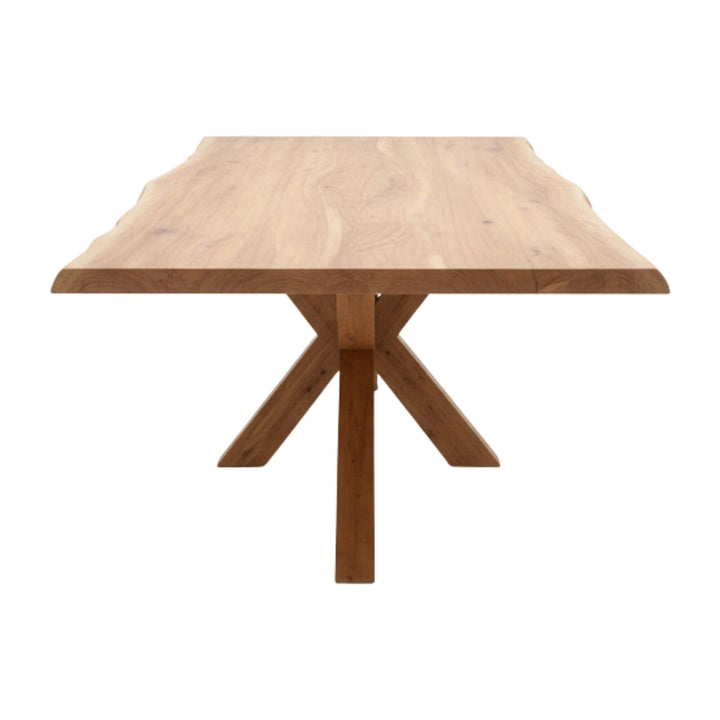 Lea dining table with X-shaped legs on a white background