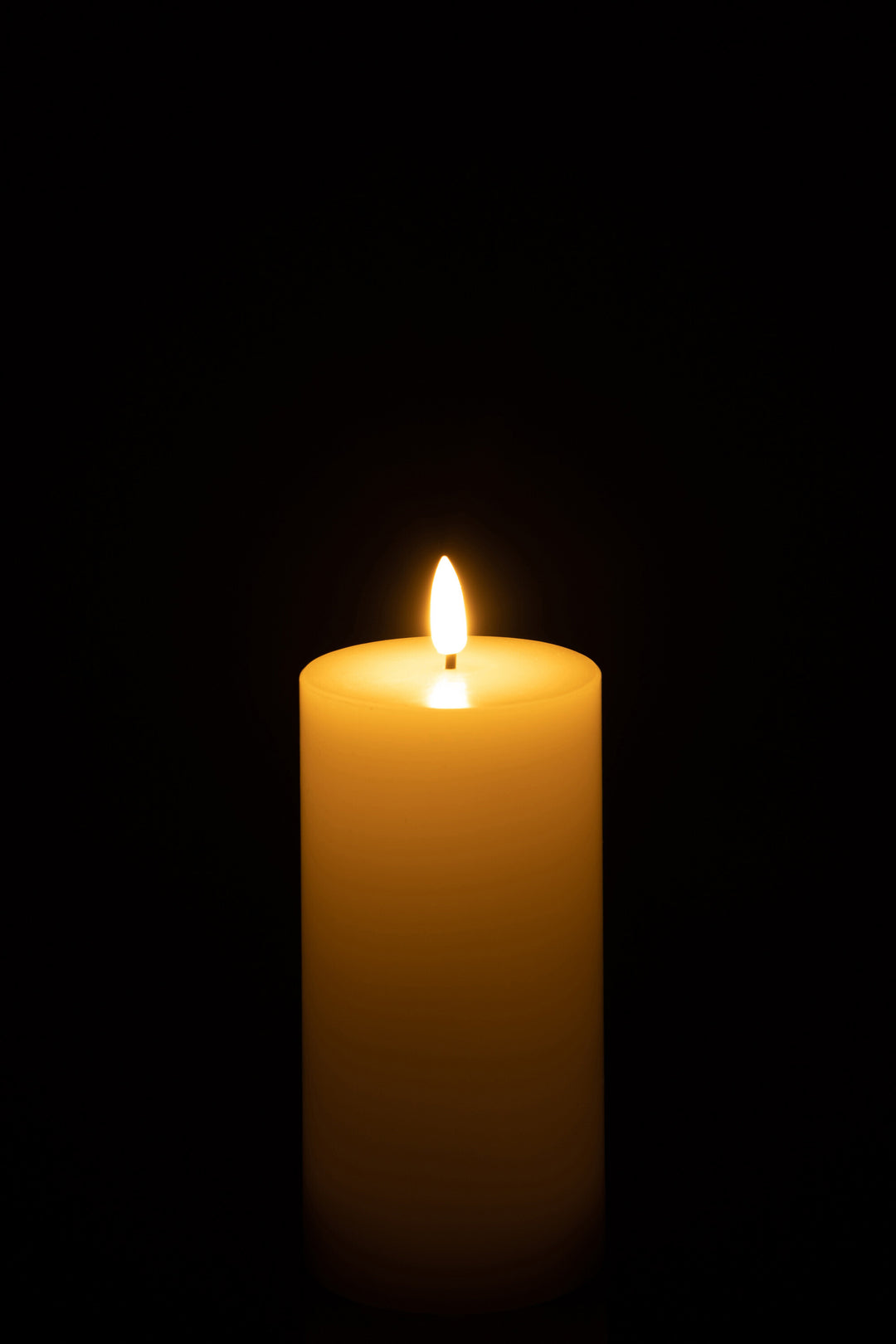 Medium Lit Led Candle White on dark background