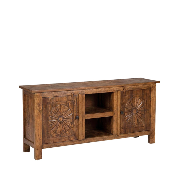 Angled view of the Legia buffet showcasing its carved teak wood doors and central open shelving.