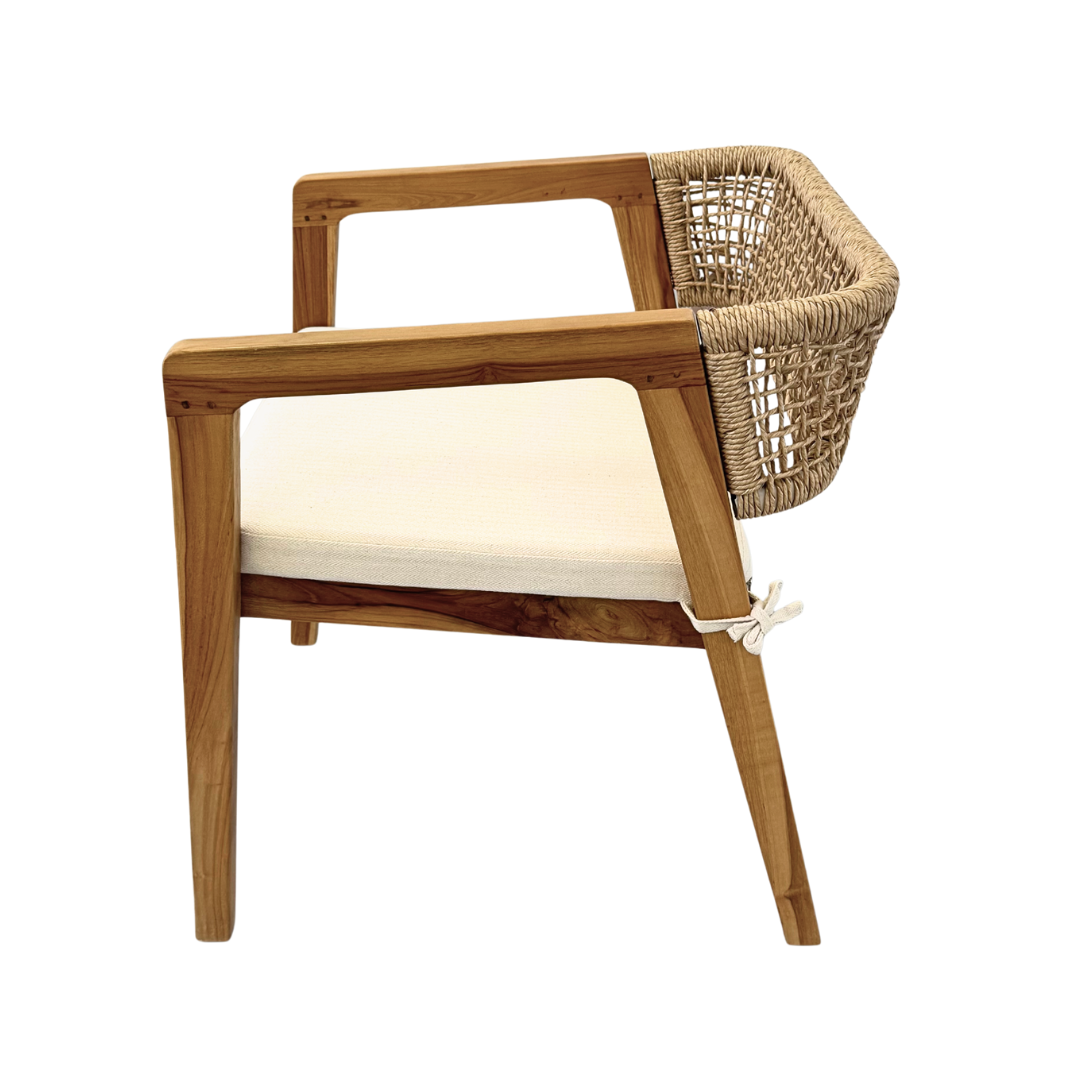 Leira Dining Chair side view highlighting teak armrest and woven detailing.