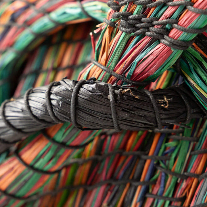 Close-up of handcrafted seaweed braid showing texture and weave.