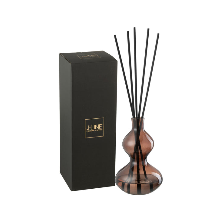Diffuser with packaging featuring the Lily Land amber glass bottle and black reeds.