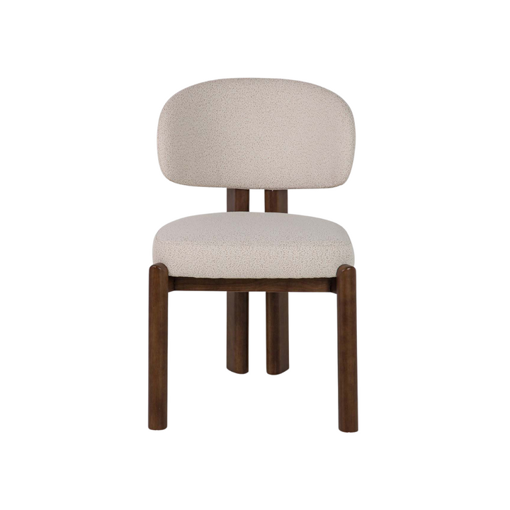 Front view of Lina dining chair with curved backrest and cushioned seat