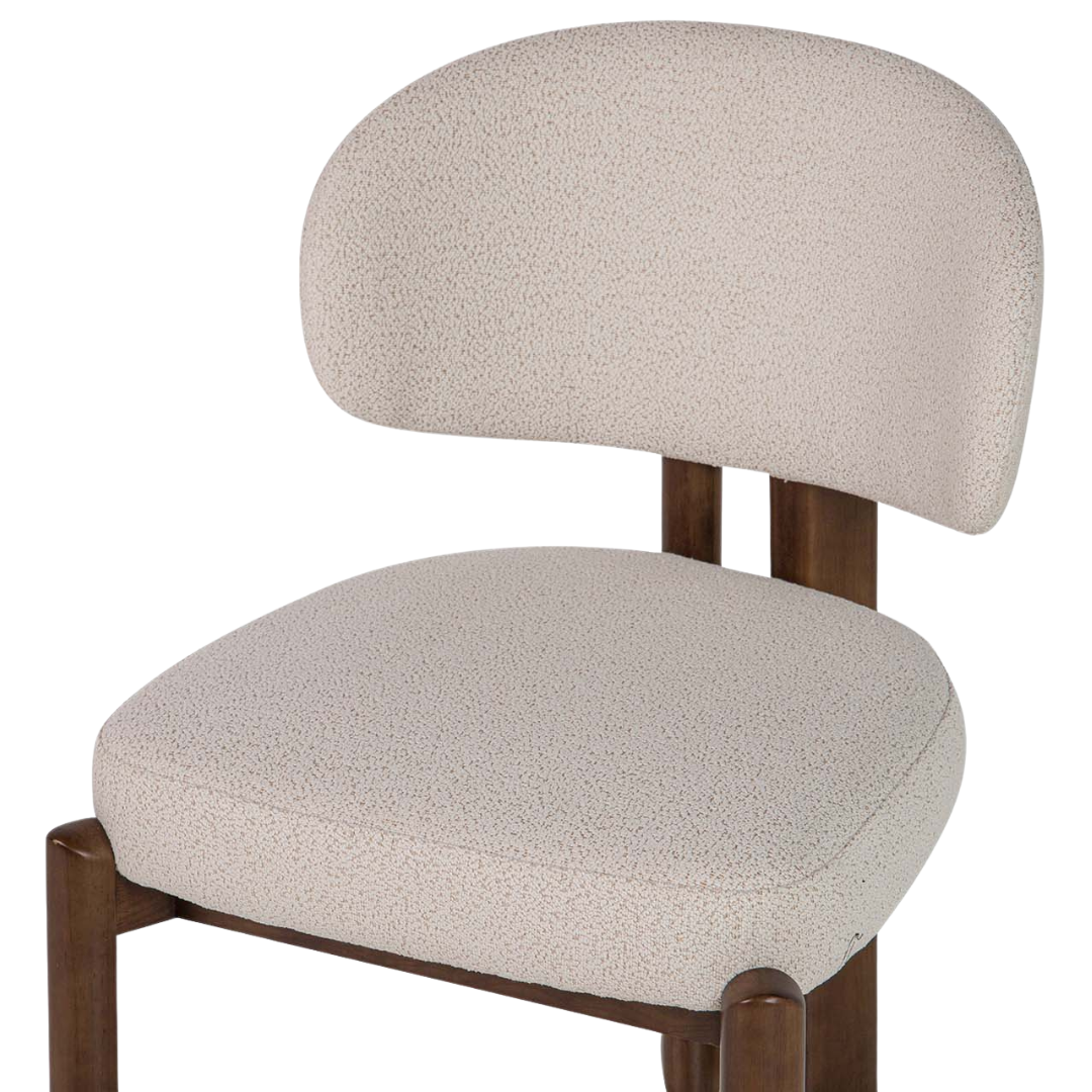 Lina dining chair angled view showing seat depth and oak structure