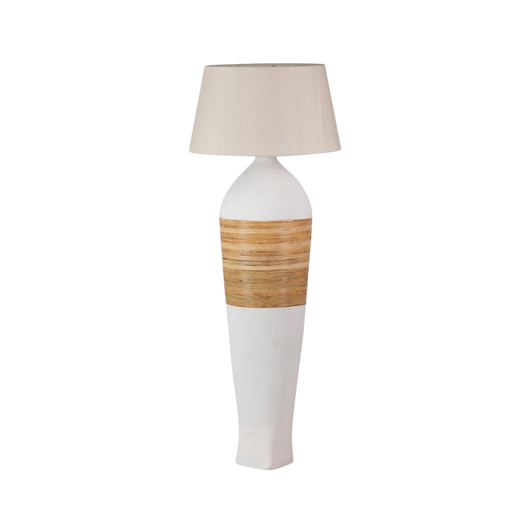 Liora floor lamp with white ceramic base, rattan band, and fabric shade.