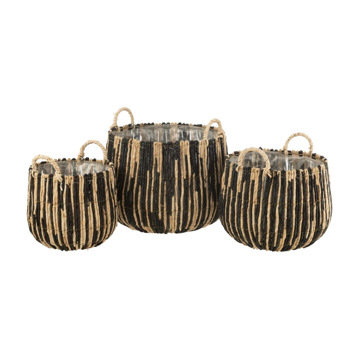 Set of Lovina Baskets in natural and black banana leaf, three sizes.
