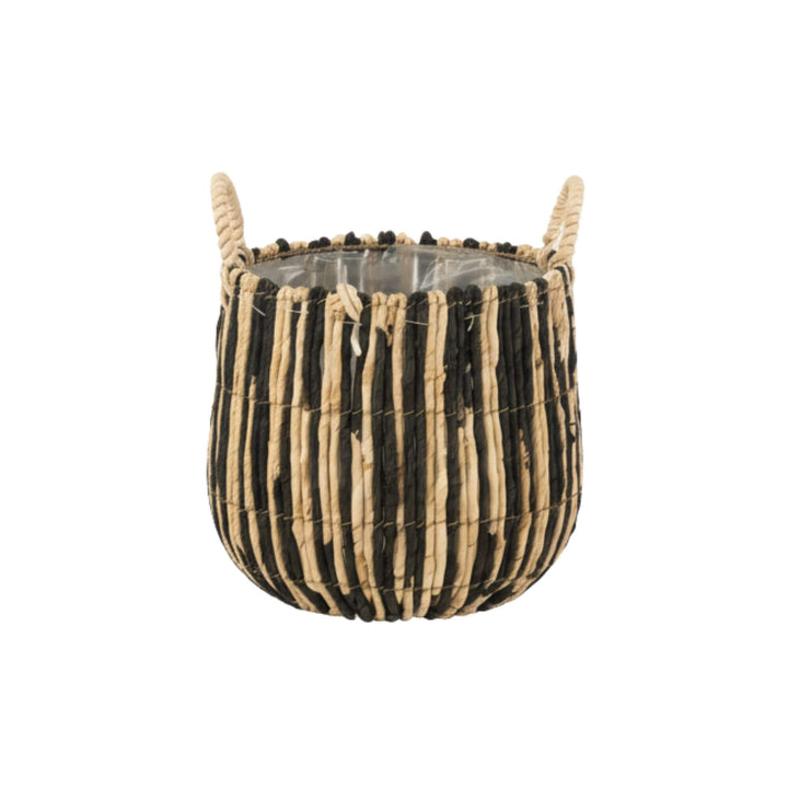 Close-up of Lovina Basket’s handwoven banana leaf texture.