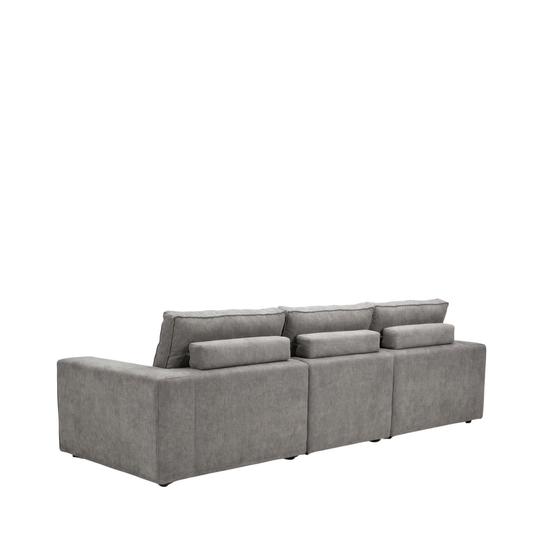Rear view of the sofa showing its clean upholstered back and structured silhouette.
