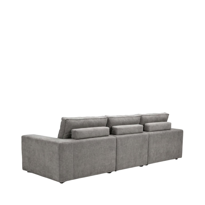 Rear view of the sofa showing its clean upholstered back and structured silhouette.