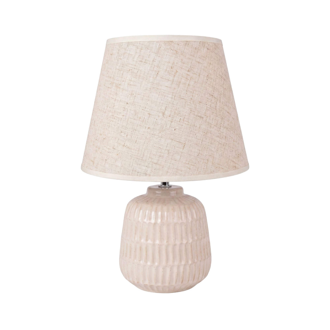Front view of the light ceramic Luma lamp with a soft neutral textile shade.