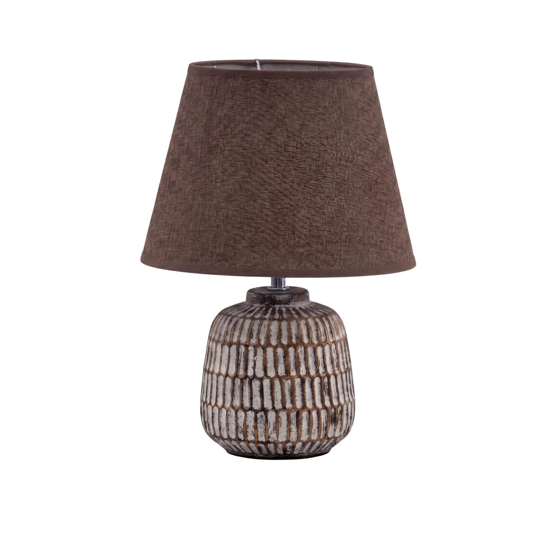 Front view of the dark ceramic Luma lamp with a brown textile shade.