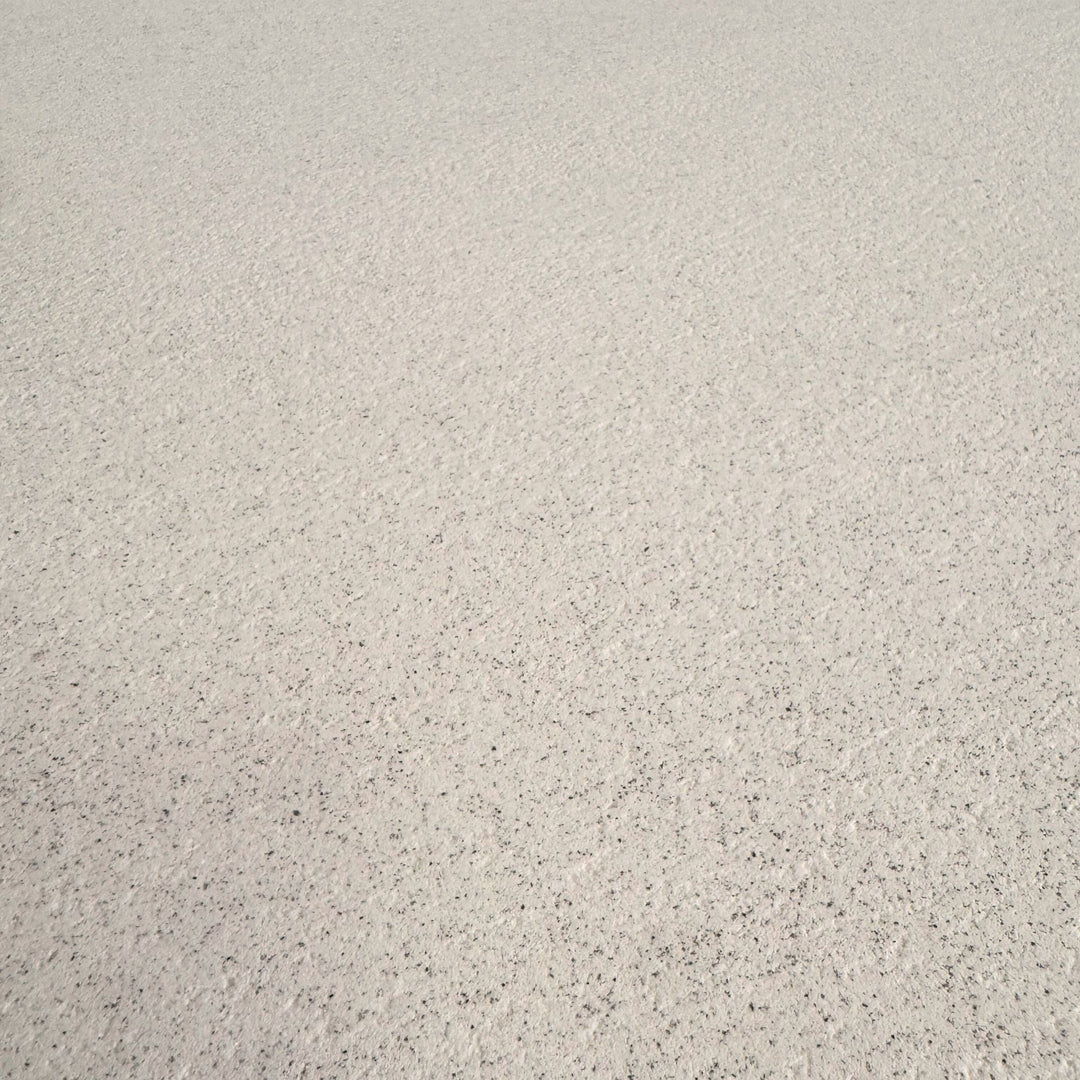 Close-up of the microcement surface showing natural texture and handcrafted detailing.
