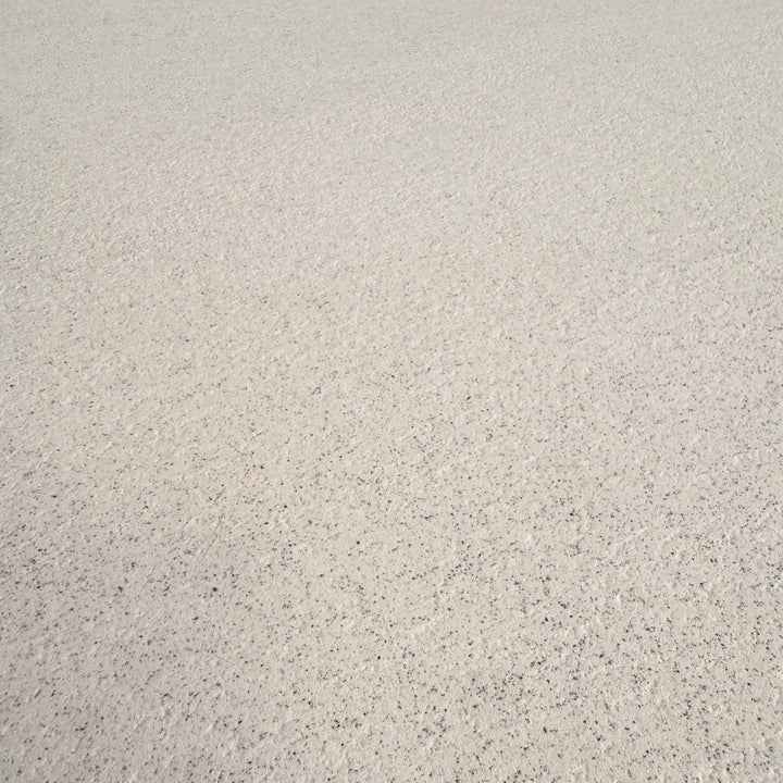 Close-up of the microcement surface showing natural texture and handcrafted detailing.