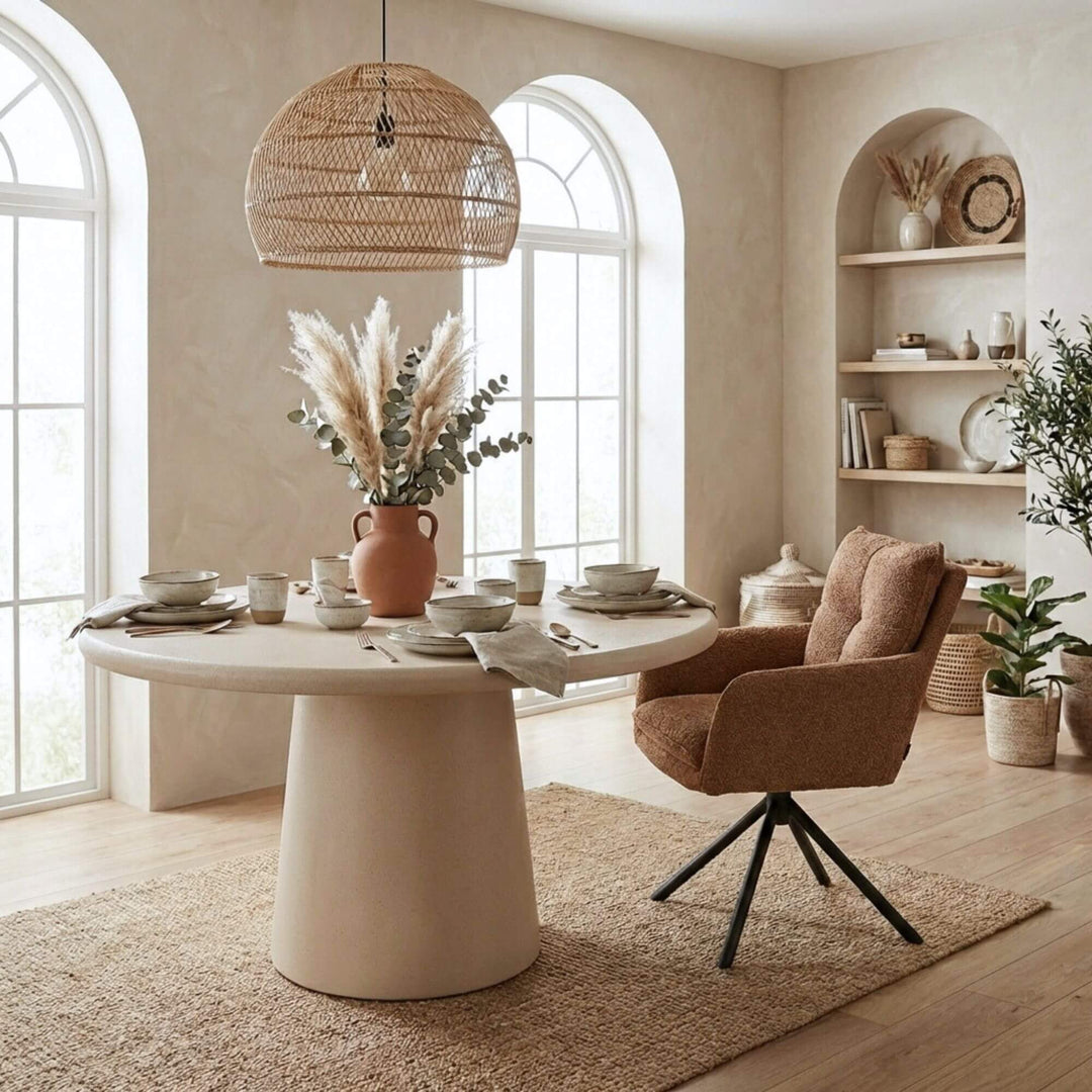 Styled dining room setting featuring the Luna table with upholstered chairs and warm neutral decor.