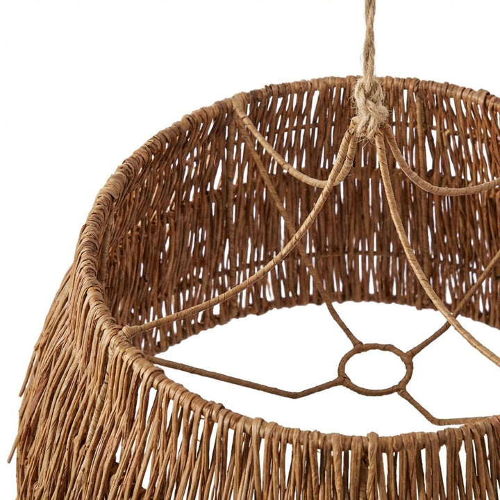 Close-up of the upper rattan structure and internal hanging frame.