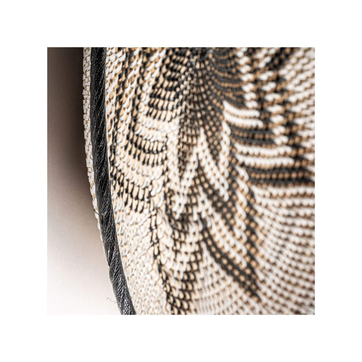 Close-up of Lyra Collection Plate B showing detailed rattan weave and natural fiber texture.