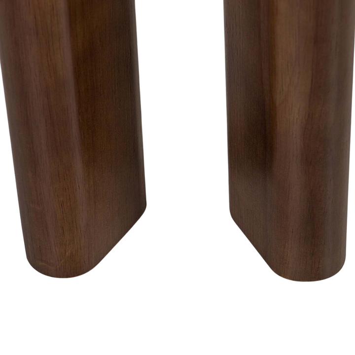 Close-up of oak leg and floor contact point of Lina dining chair

