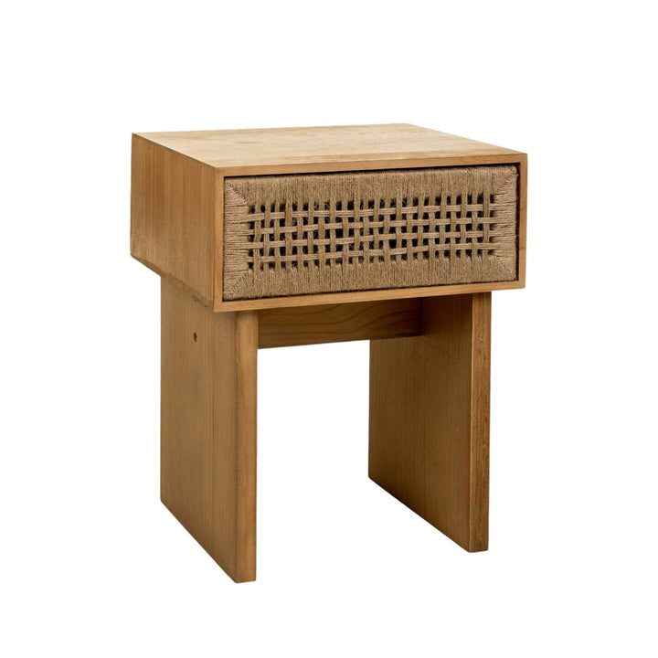 Front angled view of the Madura bedside table in natural wood with a handwoven jute drawer front