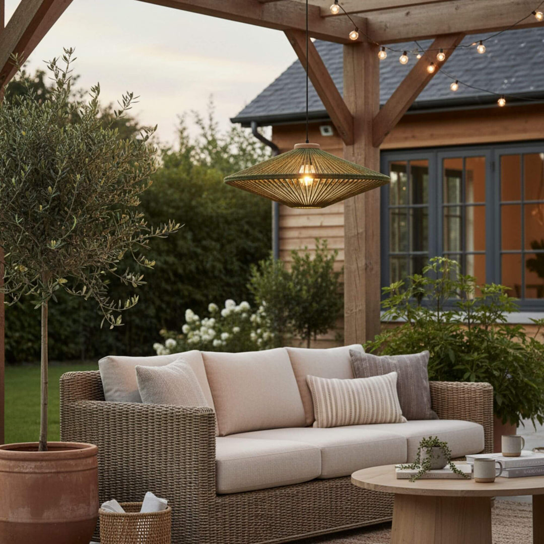 Outdoor terrace setting featuring the Magna natural fibre ceiling lamp.