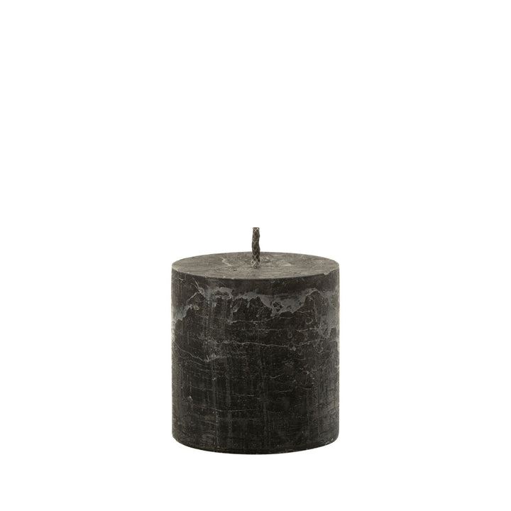 Extra Small Mahe Black Outdoor Candle standing alone in paraffin finish.