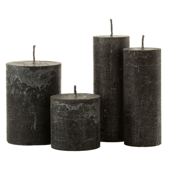 Group of Mahe Black Outdoor Candles in assorted sizes made of paraffin.