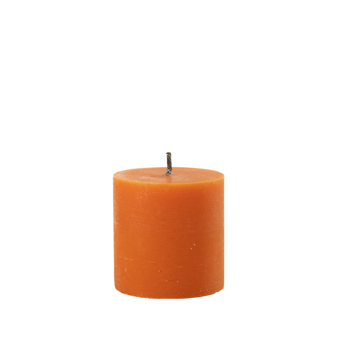 Extra Small Mahe Orange Outdoor Candle in bright orange paraffin.