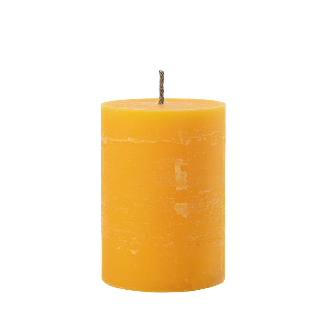 Small Mahe Yellow Outdoor Candle with textured finish.