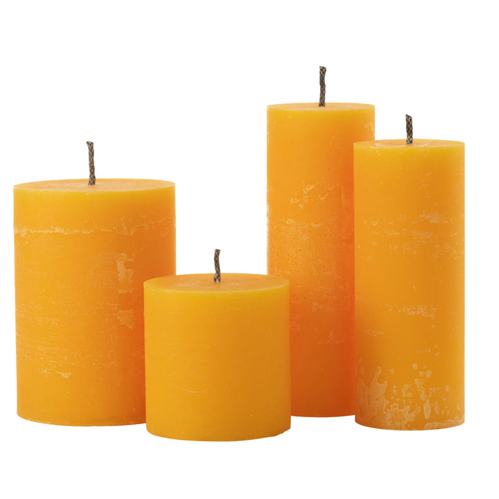 Group of Mahe Yellow Outdoor Candles in different sizes made from paraffin.