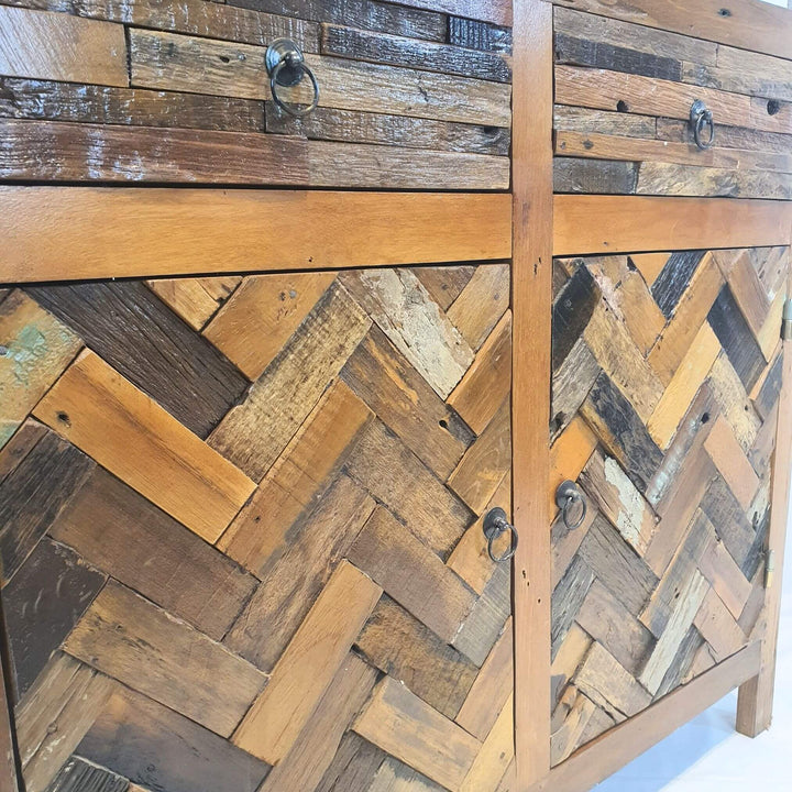 Close-up of herringbone pattern on reclaimed teak cabinet fronts