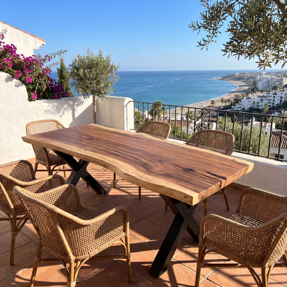 Styled outdoor-inspired dining setting featuring the Makai table in a warm Mediterranean space.