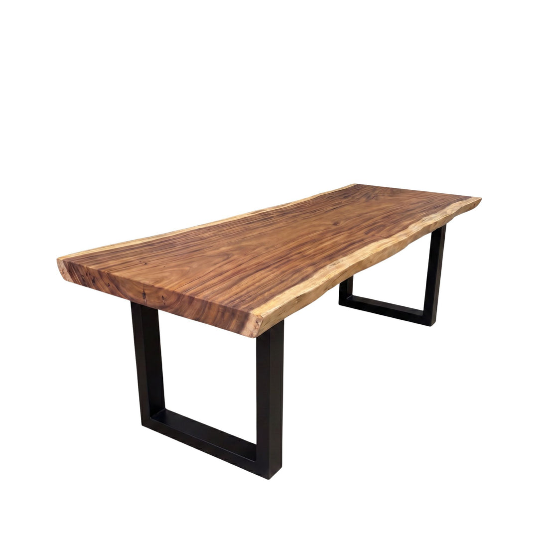 Front angled view of the dining table with a rectangular black metal base highlighting its contemporary structure.