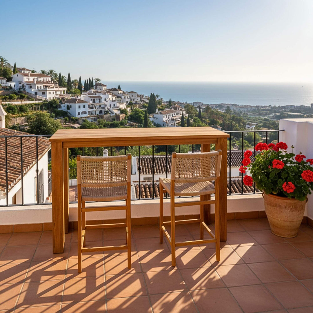 Outdoor terrace setting featuring the Maldives bar table